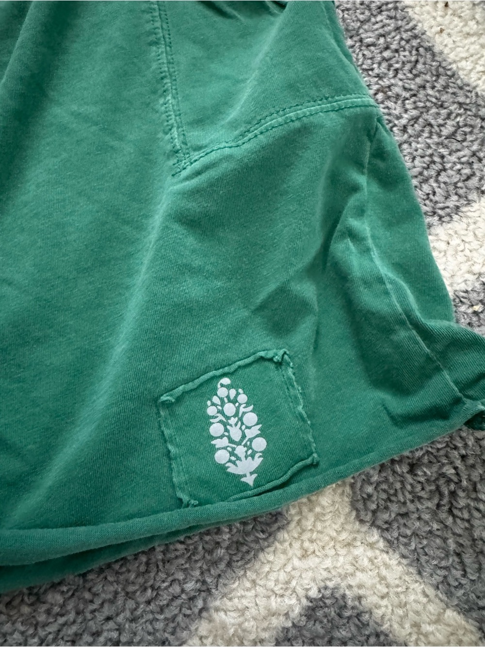 FP Movement by Free People Teal Green Cropped Tee with White Floral Patch